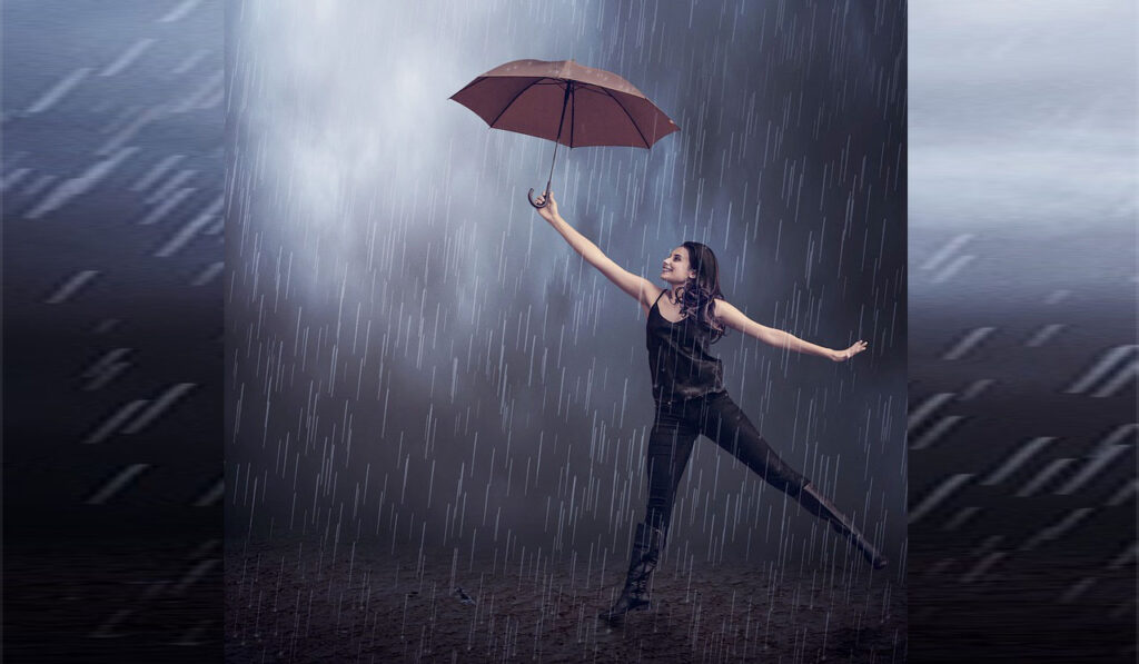 Cô gái che dù dưới mưa